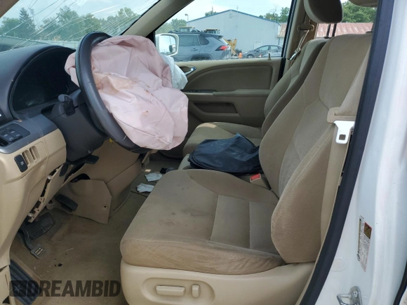 2010 Honda Odyssey EX with VIN 5FNRL3H48AB077659, listed as a Copart auction lot 62373835 with Not provided miles and Salvage title. Bid and sale history available at DreamBid. Image 7.