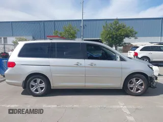 2009 Honda Odyssey Touring с VIN 5FNRL38969B013708, выставлен на аукционе IAAI как лот 42002538 с пробегом 198 220 миль миль и . История ставок и продаж доступна на DreamBid. Изображение 13.