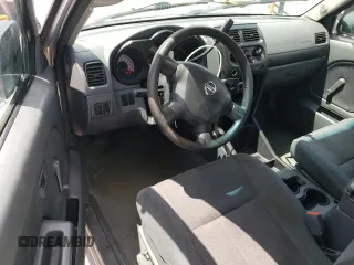 2004 Nissan Frontier XE with VIN 1N6DD26T34C454425, listed as a Copart auction lot 52404115 with 317,899 mi miles and Salvage title. Bid and sale history available at DreamBid. Image 8.
