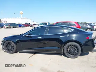 2021 Tesla Model S Long Range Plus with VIN 5YJSA1E28MF426080, listed as a IAAI auction lot 41979326 with 125,328 mi miles and . Bid and sale history available at DreamBid. Image 15.
