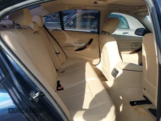 2013 BMW 3 Series 320i with VIN WBA3B1C58DK129051, listed as a IAAI auction lot 41119380 with 101,427 mi miles. Bid and sale history available at carsss.com. Image 8.