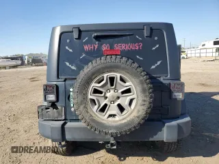 2018 Jeep Wrangler JK Unlimited Rubicon with VIN 1C4BJWFG9JL840582, listed as a Copart auction lot 73064054 with 47,590 mi miles and Salvage Title. Bid and sale history available at carsss.com. Image 6.