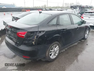2016 Ford Focus SE with VIN 1FADP3F22GL229348, listed as a IAAI auction lot 42169543 with 173,818 mi miles and . Bid and sale history available at DreamBid. Image 4.