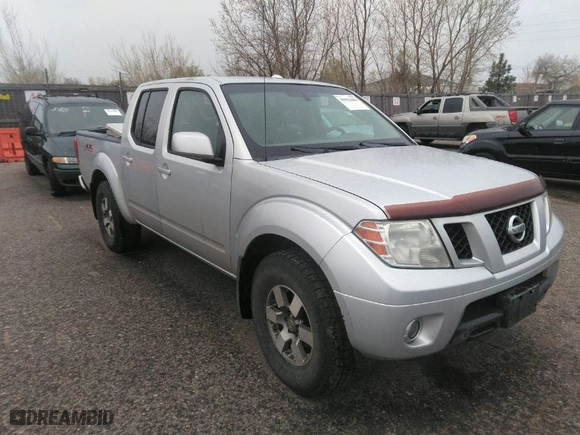 2011 Nissan Frontier PRO-4X with VIN 1N6AD0EV2BC438370, listed as a IAAI auction lot 41952484 with 217,529 mi miles. Bid and sale history available at carsss.com. Image 1.