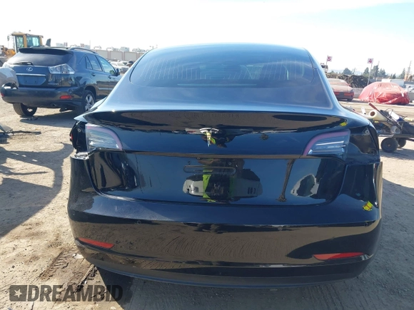 2018 Tesla Model 3 Long Range Battery with VIN 5YJ3E1EA0JF056979, listed as a IAAI auction lot 41865849 with 97,319 mi miles. Bid and sale history available at carsss.com. Image 16.