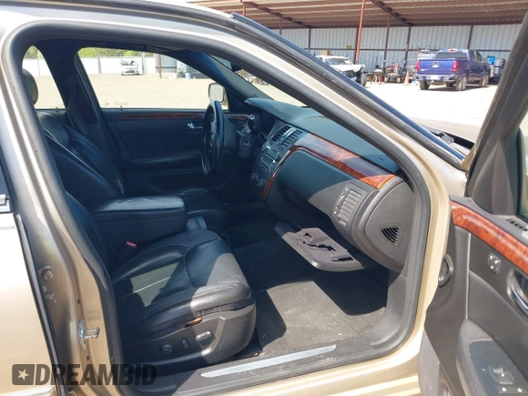 2006 Cadillac DTS w/1SC with VIN 1G6KD57Y86U209092, listed as a IAAI auction lot 41811298 with 156,676 mi miles. Bid and sale history available at carsss.com. Image 5.
