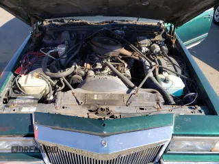 1992 Cadillac Brougham z VIN 1G6DW547XNR703499, wystawiony jako Copart lot #66709103 z przebiegiem Nie podano mil oraz Nie do naprawy. Historia ofert i sprzedaży dostępna na DreamBid. Obrazek 11.