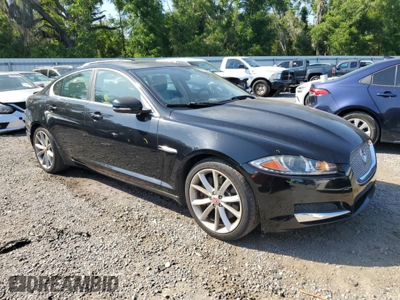 2015 Jaguar XF V6 Portfolio with VIN SAJWJ0FFXF8U60040, listed as a Copart auction lot 52912695 with 112,618 mi miles and Salvage Title. Bid and sale history available at carsss.com. Image 4.