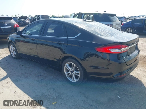 2018 Ford Fusion SE z VIN 3FA6P0H74JR125761, wystawiony jako IAAI lot #41992708 z przebiegiem 102 242 mil mil oraz . Historia ofert i sprzedaży dostępna na DreamBid. Obrazek 3.
