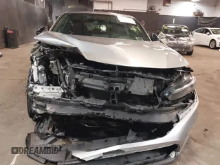 2023 Honda Civic Sport z VIN 19XFL2H83PE010062, wystawiony jako IAAI lot #41829519 z przebiegiem 37 974 mil mil oraz . Historia ofert i sprzedaży dostępna na DreamBid. Obrazek 6.