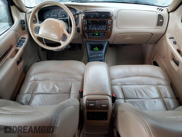 2000 Ford Explorer Limited with VIN 1FMDU75EXYZA76329, listed as a Copart auction lot 80952474 with 90,637 mi miles and Salvage title. Bid and sale history available at DreamBid. Image 8.