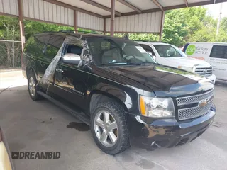 2008 Chevrolet Suburban LTZ with VIN 1GNFK16328R161721, listed as a IAAI auction lot 42130017 with 242,266 mi miles. Bid and sale history available at carsss.com. Image 1.