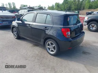 2009 Scion xD with VIN JTKKU10409J041654, listed as a IAAI auction lot 42036558 with 122,661 mi miles. Bid and sale history available at carsss.com. Image 3.
