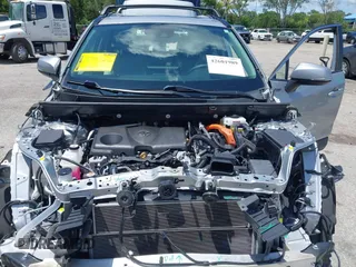 2021 Toyota RAV4 Hybrid LE with VIN 2T3B6RFV2MW018967, listed as a IAAI auction lot 42601989 with 71,046 mi miles and . Bid and sale history available at DreamBid. Image 10.