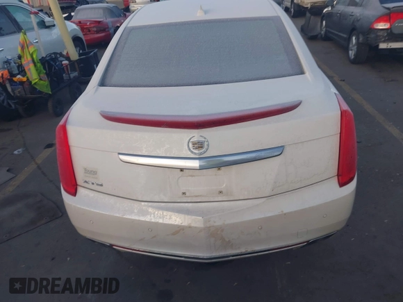 2014 Cadillac XTS Premium with VIN 2G61P5S30E9123057, listed as a IAAI auction lot 41301457 with 123,042 mi miles and . Bid and sale history available at DreamBid. Image 16.