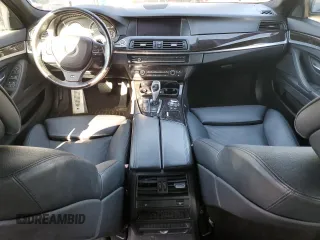 2013 BMW 5 Series 550i xDrive with VIN WBAFU9C52DDY71326, listed as a Copart auction lot 49796115 with 103,411 mi miles and Clean Title. Bid and sale history available at carsss.com. Image 8.