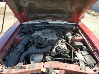 2003 Ford Mustang Deluxe с VIN 1FAFP44463F438457, выставлен на аукционе Copart как лот 57599045 с пробегом 41 349 миль миль и Списание • Salvage title. История ставок и продаж доступна на DreamBid. Изображение 11.