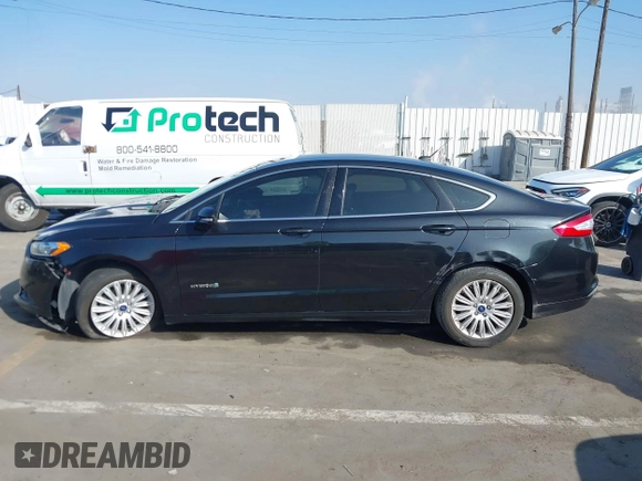2013 Ford Fusion SE Hybrid with VIN 3FA6P0LU4DR325699, listed as a IAAI auction lot 41677237 with 129,004 mi miles. Bid and sale history available at carsss.com. Image 14.
