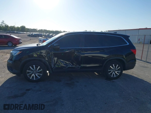 2021 Honda Pilot EX-L with VIN 5FNYF5H55MB044677, listed as a IAAI auction lot 42038704 with 38,684 mi miles and . Bid and sale history available at carsss.com. Image 15.