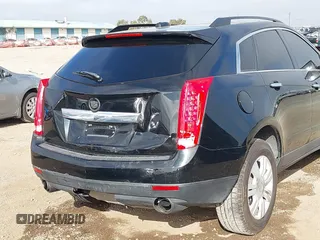 2015 Cadillac SRX with VIN 3GYFNAE37FS598023, listed as a IAAI auction lot 41198546 with 127,373 mi miles and . Bid and sale history available at carsss.com. Image 6.