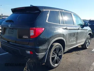 2021 Honda Passport Sport with VIN 5FNYF8H25MB030432, listed as a IAAI auction lot 41184469 with 44,315 mi miles and . Bid and sale history available at DreamBid. Image 4.
