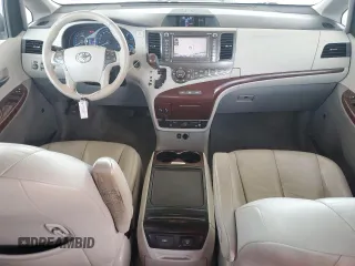 2012 Toyota Sienna XLE AAS с VIN 5TDYK3DC1CS240100, выставлен на аукционе Copart как лот 56975235 с пробегом 251 340 миль миль и Списание • Salvage title. История ставок и продаж доступна на DreamBid. Изображение 8.