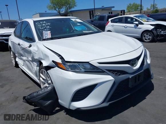 2019 Toyota Camry LE z VIN 4T1B11HK6KU754349, wystawiony jako IAAI lot #42262271 z przebiegiem 77 312 mil mil oraz . Historia ofert i sprzedaży dostępna na DreamBid. Obrazek 1.