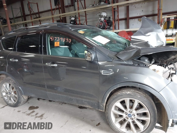 2016 Ford Escape SE with VIN 1FMCU9G93GUA33373, listed as a IAAI auction lot 41739890 with Not Provided miles and . Bid and sale history available at DreamBid. Image 13.