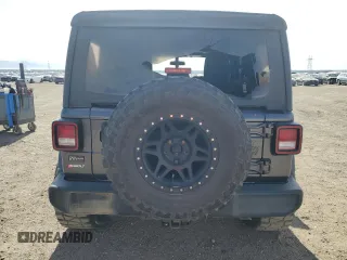 2020 Jeep Wrangler Unlimited Willys with VIN 1C4HJXDG5LW246978, listed as a Copart auction lot 52930515 with 117,020 mi miles and Salvage title. Bid and sale history available at DreamBid. Image 6.