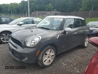2011 MINI Countryman S z VIN WMWZC5C56BWL53827, wystawiony jako Copart lot #58953505 z przebiegiem Nie podano mil oraz Szkody całkowita. Historia ofert i sprzedaży dostępna na DreamBid. Obrazek 1.