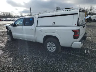 2024 Nissan Frontier SV with VIN 1N6ED1FJXRN637443, listed as a Copart auction lot 49068835 with 6,600 mi miles and Salvage Title. Bid and sale history available at carsss.com. Image 2.