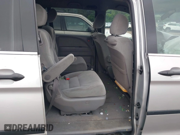 2010 Honda Odyssey LX with VIN 5FNRL3H21AB100181, listed as a IAAI auction lot 42258010 with 246,463 mi miles and . Bid and sale history available at DreamBid. Image 8.