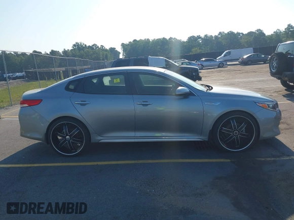 2017 Kia Optima z VIN KNAGT4LE2H5014899, wystawiony jako IAAI lot #42578989 z przebiegiem 110 363 mil mil oraz . Historia ofert i sprzedaży dostępna na DreamBid. Obrazek 13.