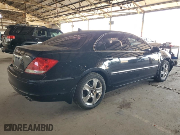 2005 Acura RL z VIN JH4KB16575C011187, wystawiony jako Copart lot #60276655 z przebiegiem 107 378 mil mil oraz Szkoda całkowita • Salvage title. Historia ofert i sprzedaży dostępna na DreamBid. Obrazek 3.
