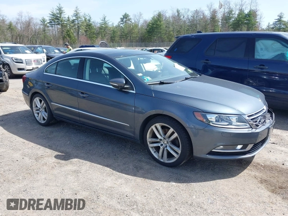 2014 Volkswagen CC Lux with VIN WVWRP7AN7EE501483, listed as a IAAI auction lot 42090985 with 121,737 mi miles. Bid and sale history available at carsss.com. Image 1.
