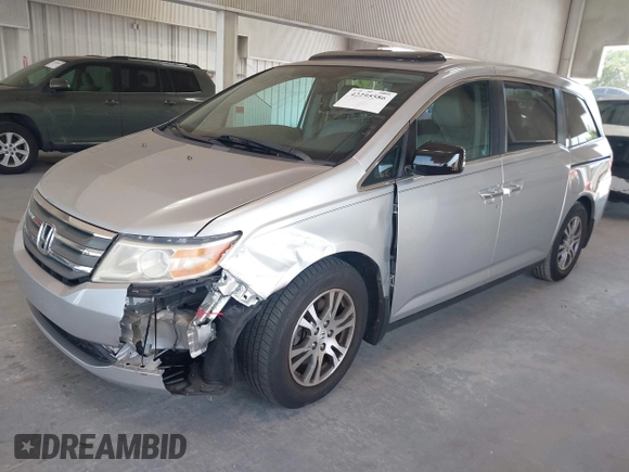 2012 Honda Odyssey EX-L with VIN 5FNRL5H67CB005013, listed as a IAAI auction lot 42295586 with 200,611 mi miles and . Bid and sale history available at DreamBid. Image 17.