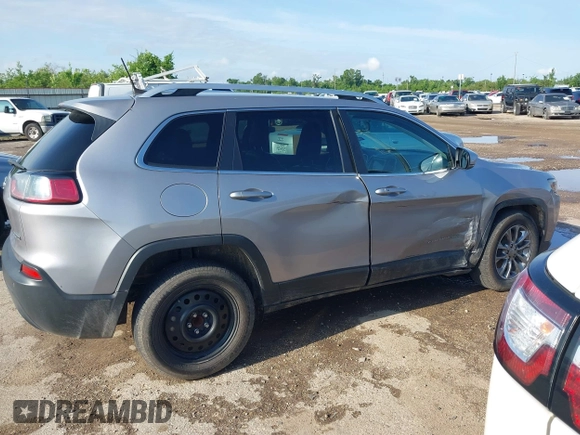 2019 Jeep Cherokee Latitude Plus with VIN 1C4PJLLB5KD403431, listed as a IAAI auction lot 42127918 with 94,360 mi miles and . Bid and sale history available at DreamBid. Image 12.