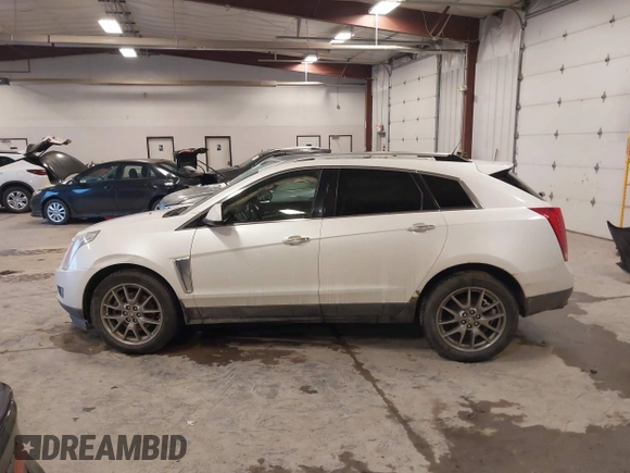 2015 Cadillac SRX Premium Collection with VIN 3GYFNGE32FS564168, listed as a IAAI auction lot 41355787 with 182,949 mi miles. Bid and sale history available at carsss.com. Image 14.
