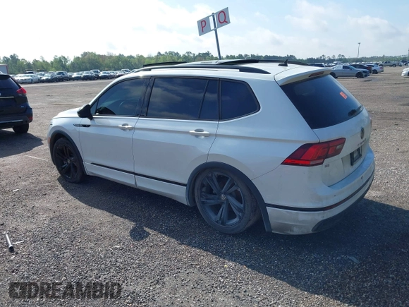 2023 Volkswagen Tiguan SE R-Line Black with VIN 3VVCB7AX9PM042025, listed as a IAAI auction lot 41913943 with 114,097 mi miles and . Bid and sale history available at DreamBid. Image 3.