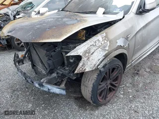2016 BMW X4 xDrive28i with VIN 5UXXW3C55G0R20074, listed as a IAAI auction lot 42067204 with 91,169 mi miles. Bid and sale history available at carsss.com. Image 12.