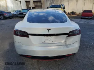 2013 Tesla Model S with VIN 5YJSA1AC8DFP10890, listed as a Copart auction lot 60735174 with 51,847 mi miles and Clean Title. Bid and sale history available at DreamBid. Image 6.