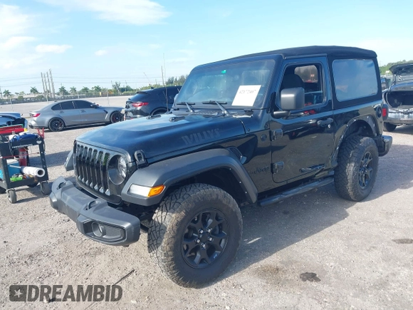 2021 Jeep Wrangler Sport z VIN 1C4GJXAN7MW796019, wystawiony jako IAAI lot #42172407 z przebiegiem 34 128 mil mil oraz . Historia ofert i sprzedaży dostępna na DreamBid. Obrazek 2.
