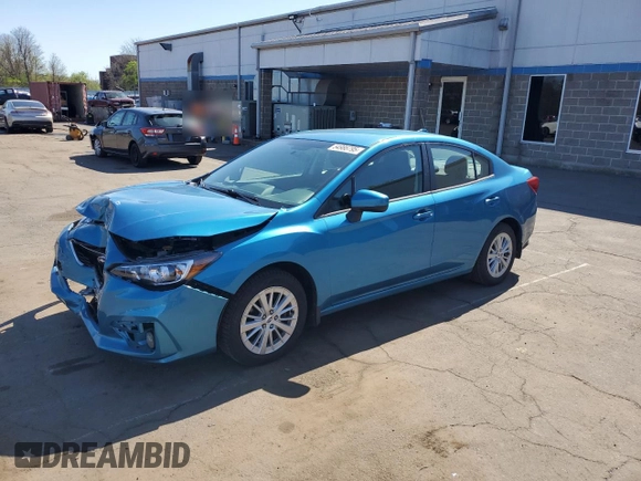 2018 Subaru Impreza Premium with VIN 4S3GKAD63J3605854, listed as a Copart auction lot 54986795 with 59,119 mi miles and Salvage title. Bid and sale history available at DreamBid. Image 1.