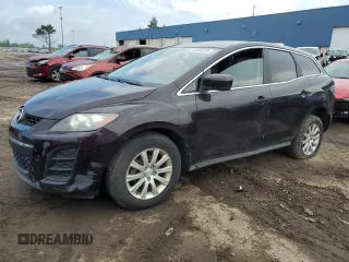 2010 Mazda CX-7 SV z VIN JM3ER2W55A0346614, wystawiony jako Copart lot #60392595 z przebiegiem 144 816 mil mil oraz Czysty tytuł • Clean title. Historia ofert i sprzedaży dostępna na DreamBid. Obrazek 1.