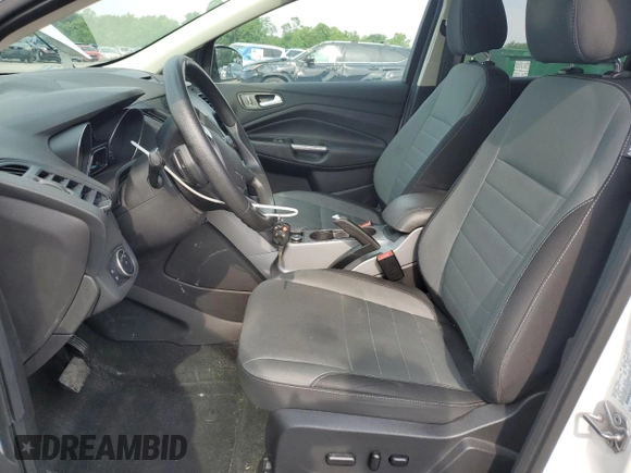 2016 Ford Escape SE z VIN 1FMCU9G97GUB45352, wystawiony jako Copart lot #60001055 z przebiegiem 93 685 mil mil oraz Szkoda całkowita • Salvage title. Historia ofert i sprzedaży dostępna na DreamBid. Obrazek 7.