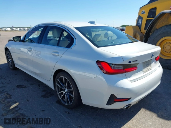 2021 BMW 3 Series 330i xDrive with VIN WBA5R7C0XMFK54525, listed as a IAAI auction lot 42320181 with 54,576 mi miles and . Bid and sale history available at DreamBid. Image 3.