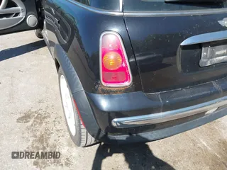 2003 MINI Hardtop with VIN WMWRC33463TC41773, listed as a IAAI auction lot 42223276 with 115,127 mi miles and . Bid and sale history available at DreamBid. Image 6.