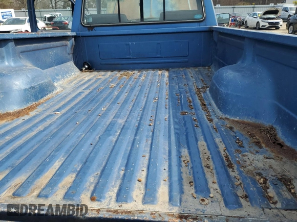 1990 Ford F-150 with VIN 1FTEF14N6LNB21235, listed as a Copart auction lot 46149815 with 76,777 mi miles and Salvage Title. Bid and sale history available at carsss.com. Image 8.