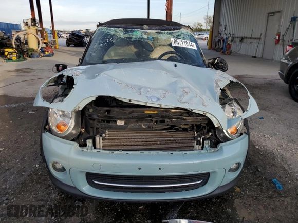2012 MINI Convertible z VIN WMWZN3C59CT135351, wystawiony jako Copart lot #86711044 z przebiegiem 93 515 mil mil oraz Nie do naprawy • Non repairable. Historia ofert i sprzedaży dostępna na DreamBid. Obrazek 5.