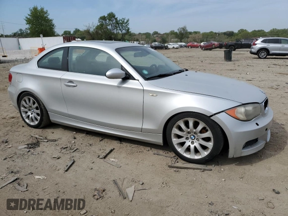 2009 BMW 1 Series 128i with VIN WBAUP73579VK74936, listed as a Copart auction lot 54558905 with 128,563 mi miles and Clean Title. Bid and sale history available at carsss.com. Image 4.